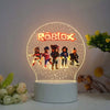 Roblox two-dimensional night light with game characters and LED glow, perfect decorative accessory for kids' rooms and fans.