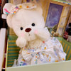 Little Bear Plush Doll in Floral Dress, featuring a kawaii design with changeable clothes, perfect for cuddling and playtime.