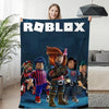 Woman holding a Roblox-themed winter sofa blanket with colorful character design