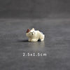 Japanese cat statue miniature for fairy garden decor, made of durable plastic, size 2.5x1.5cm, perfect for bonsai and dollhouses.