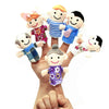 Hand with soft animal finger puppet toys for imaginative play and storytelling.