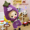 Mini piggy BJD doll in eggplant costume with purple pants in colorful toy room setting.