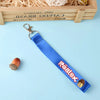 Blue Roblox-themed keychain lanyard with cartoon print, perfect for keys or backpacks. Durable and colorful accessory.