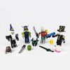 Roblox-themed collectible dolls with accessories, featuring swords, hats, and helmets for imaginative play and decoration.