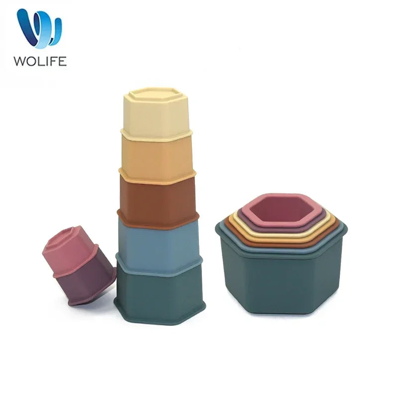 Colorful baby silicone stacking cups set for Montessori education and play, BPA-free, promotes fine motor skills and problem-solving.