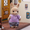 Cute miniature dollhouse rabbit critter in purple outfit and striped pants standing in a detailed playset room.