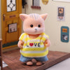 Cute miniature rabbit critter in a dollhouse, wearing a striped shirt with "LOVE" inscription, for imaginative DIY playsets.