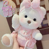 Little Bear Plush Doll with pink checkered outfit and changeable clothes, ideal for cuddling and creative play.