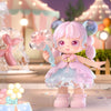 Cute anime-inspired figure from Miana Meet in Wonderland series with pastel dress and flower accessory in magical setting.