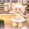 Cute Miana Meet in Wonderland anime figure holding cake in pastel bakery setting