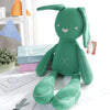 Green bunny plush toy with floppy ears, perfect for cuddles and gifts. Ideal for babies and toddlers seeking comfort and warmth.