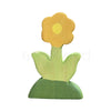 Wooden flower piece from kids Montessori scene building toy set for imaginative play.