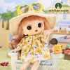 Adorable mini piggy BJD doll in a floral dress and heart-shaped sunglasses, seated outdoors, perfect for collectors and doll enthusiasts.