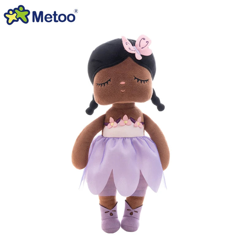 Metoo Angela Doll in lavender dress with floral accents, soft plush toy for babies and toddlers, perfect gift for special occasions.