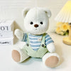 Little Bear Plush Doll wearing striped shirt and green overalls, includes changeable clothes for creative play and cuddling.