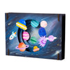 3D Coloring Craft Kit space-themed model with colorful planets and a spaceship for kids to assemble and color.