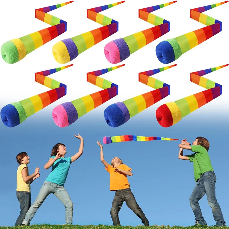 Kids playing with Rainbow Tail Ball for outdoor sensory fun, showcasing colorful design and active play coordination.