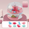 Mini Dinosaur Gashapon Grabbing Machine toy with colorful dinosaur capsules for interactive play on a pink base.