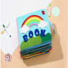 Montessori baby cloth book with rainbow cover for early learning and sensory development.