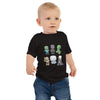 Baby in black jersey tee with colorful Minecraft mobs design.