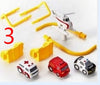 Adventure Parking Lot Car Track toy set with helicopter, ambulance, fire truck, police car, yellow tracks, and ramps for kids.