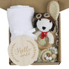 Baby teething toy gift set with gauze blanket, beech wood toys, and milestone disc in a decorative box.