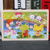 Colorful children's wooden jigsaw puzzle with playful frog and animal characters, promoting learning and fun for kids.