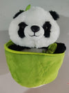 Plush panda pillow with bamboo tube design, featuring a smiling panda face.