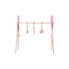 Wooden baby fitness frame with pink accents and hanging toys for infant play and motor skill development.