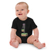 Baby wearing organic cotton bodysuit with Minecraft Enderman design, smiling and sitting on the floor.