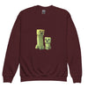 Youth Crewneck Sweatshirt with Minecraft Creeper design in maroon, perfect for young gamers, soft cotton blend for comfort and style.