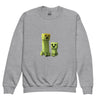 Youth crewneck sweatshirt with Minecraft Creeper design, ideal for young gamers. Made from a cozy cotton-polyester blend.